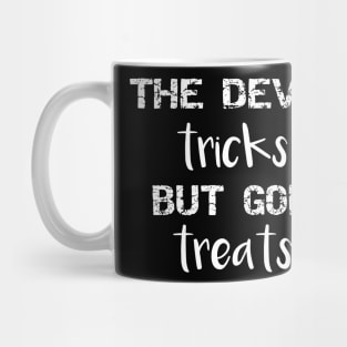 The Devil Tricks But God Treats Mug